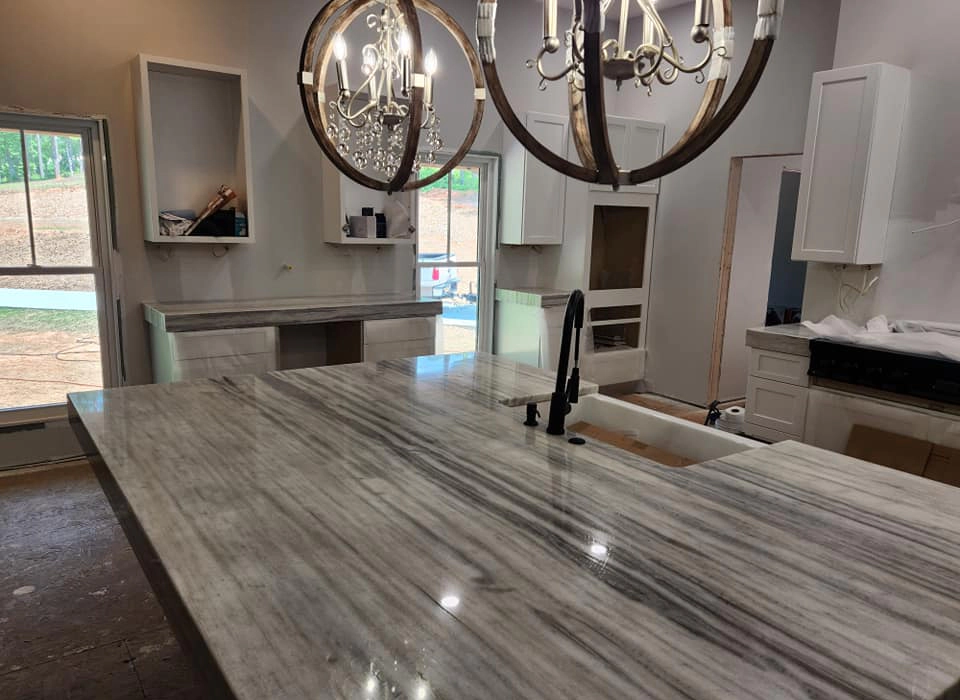 an elegant looking kitchen with a newly installed countertop